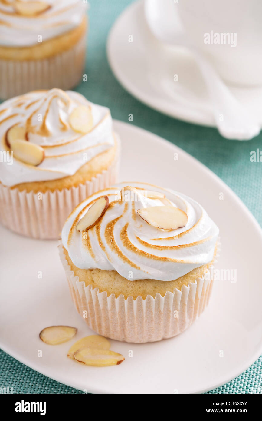 Frappuccino in a glass with whipped cream and almond milk Stock Photo