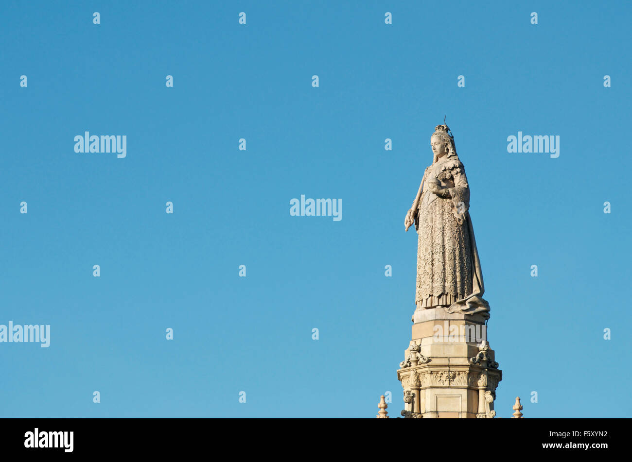 Statue of Queen Victoria on top of the Doulton Terracotta Fountain, Glasgow Green. Stock Photo