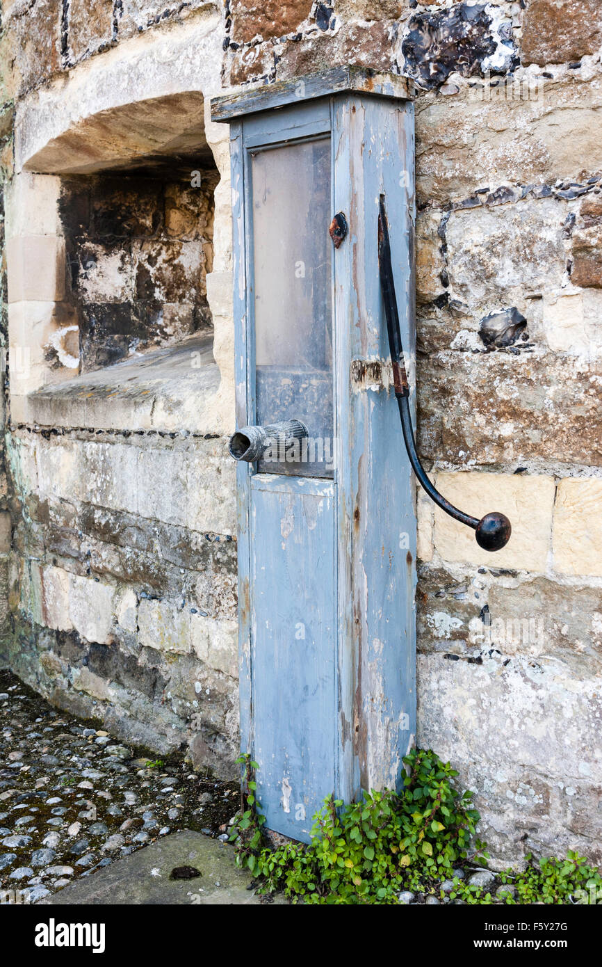 English wooden hand pump from the 18th century at Deal Castle. Wood