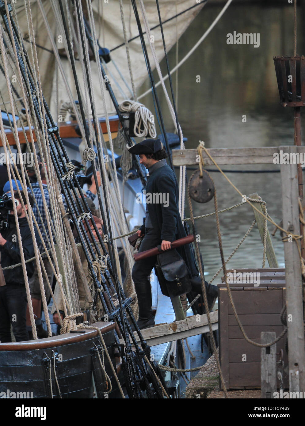 Aidan Turner who plays Poldark in the BBC drama boards a Ship in harbour.  Featuring: Aidan Turner Where: Penzance, United Kingdom When: 21 Sep 2015 Stock Photo