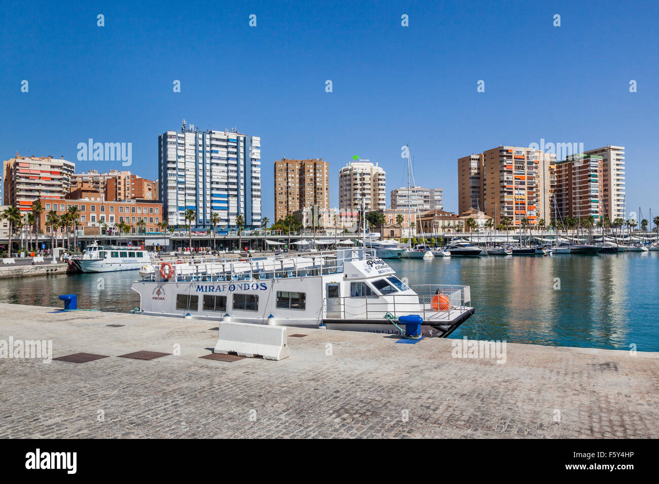 sightseeing tourboat at Muelle Dos, Port of Malaga, Costa del Sol, Andalusia, Spain Stock Photo