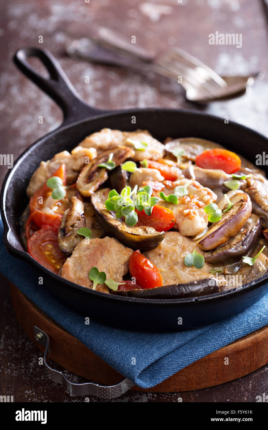 Chicken with tomatoes and eggplant with creamy sauce Stock Photo Alamy