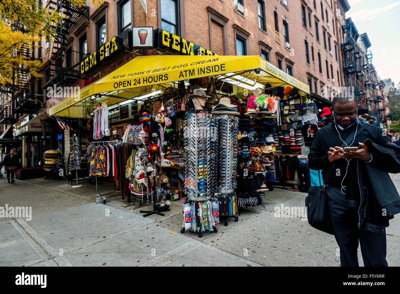 New York, NY 6 November 2015 - Man with an iPhone outside Gem Spa on Saint Mark's Place ©Stacy Walsh Rosenstock/Alamy Stock Photo