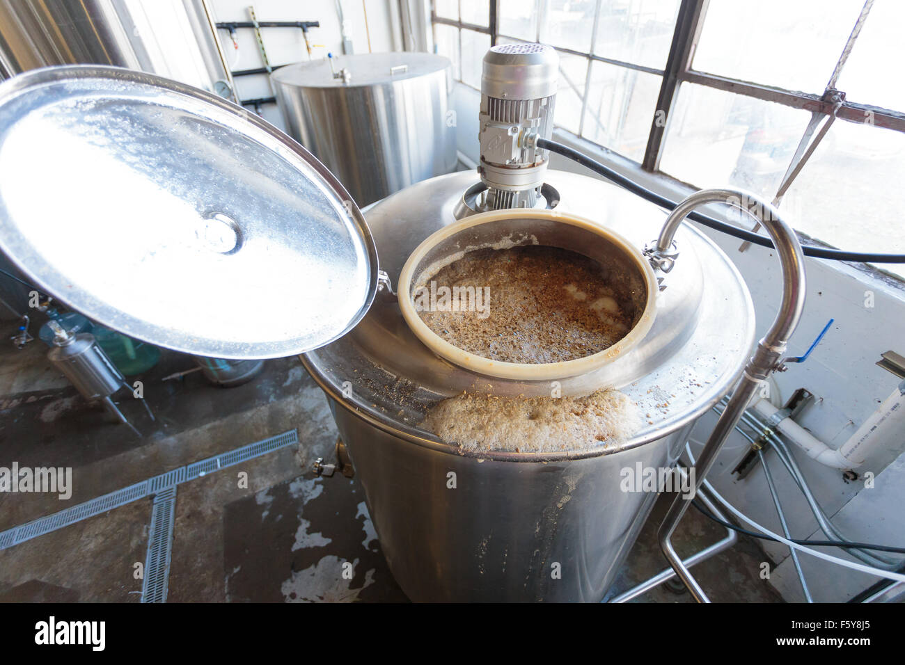 EUGENE, OR NOVEMBER 4, 2015 Boiling all grain mash to create wort in