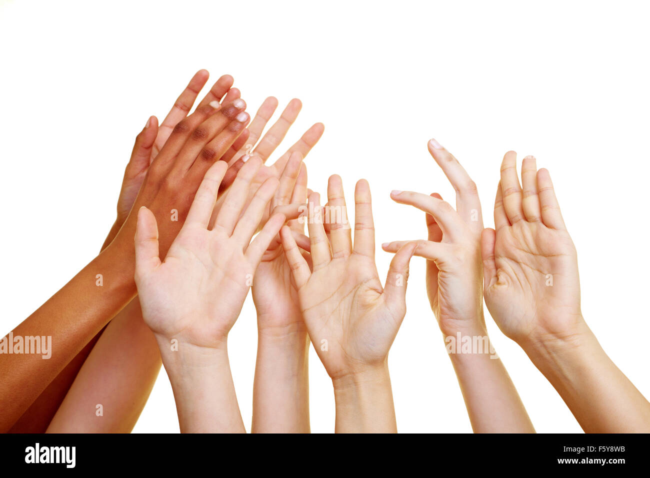 Many desperate hands reaching into the air Stock Photo