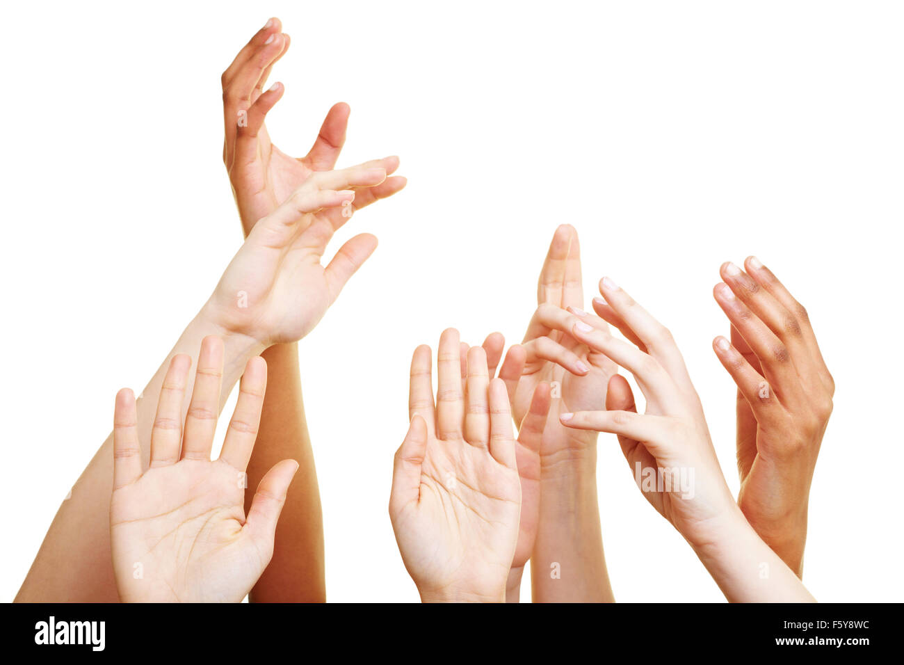Many desperate hands reaching into the air Stock Photo