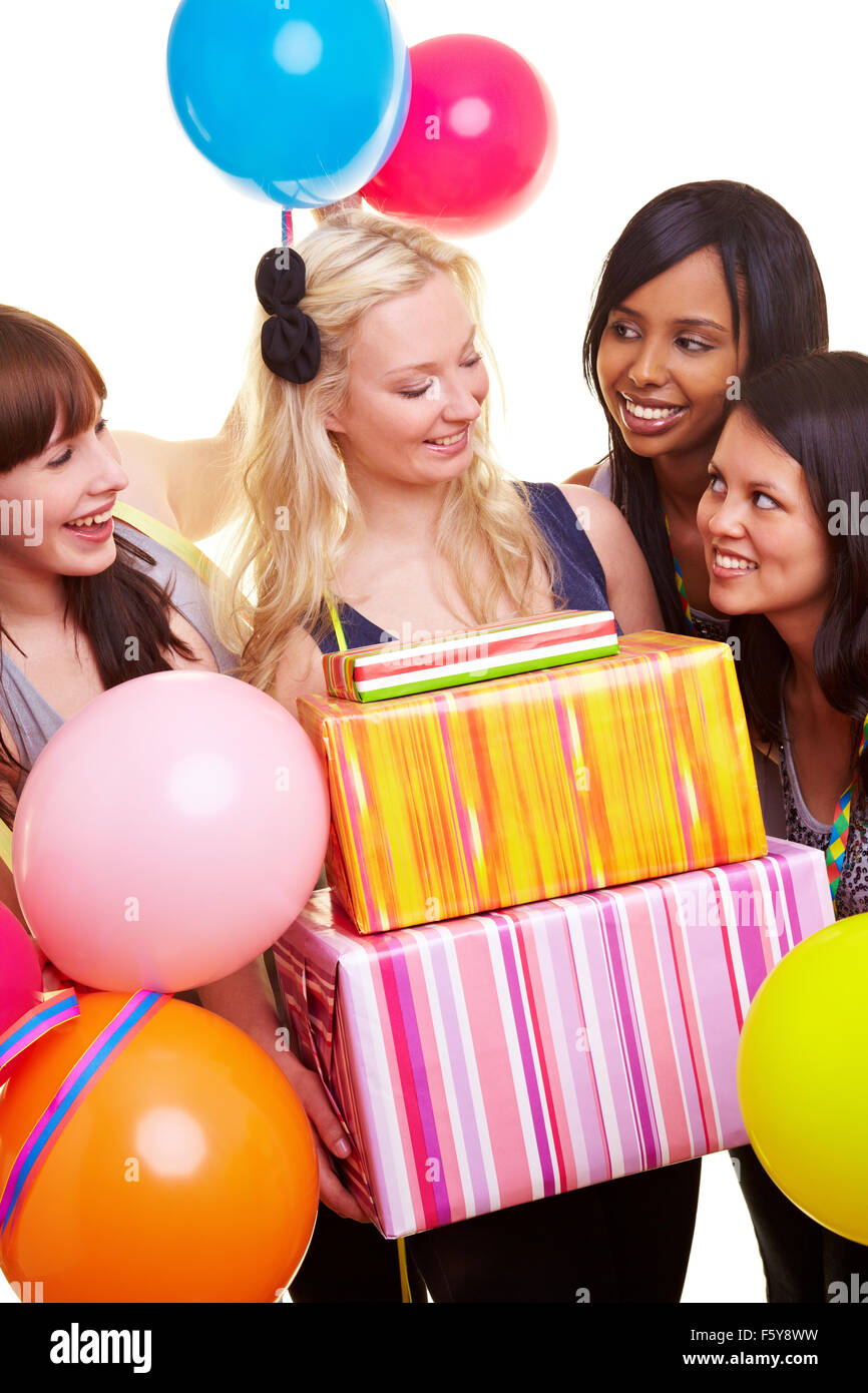 Four happy young women with gifts and balloons Stock Photo - Alamy