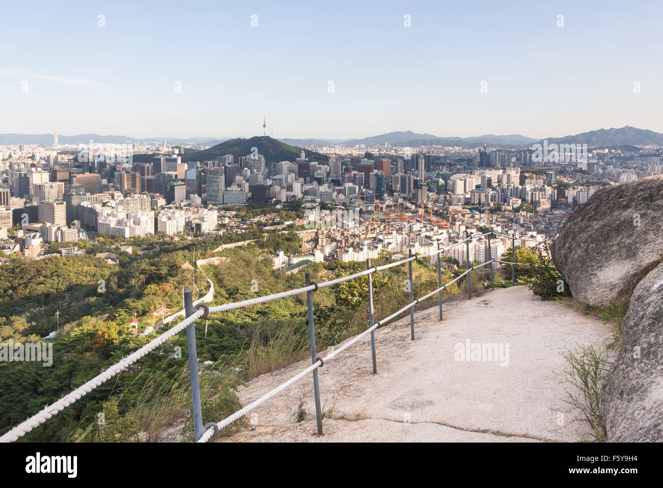 An aerial view of Seoul, South Korea capital city, from an hill north of the city that offers various popular hiking trails alon Stock Photo