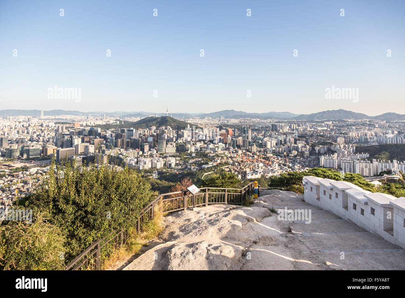 An aerial view of Seoul, South Korea capital city, from an hill north of the city that offers various popular hiking trails alon Stock Photo