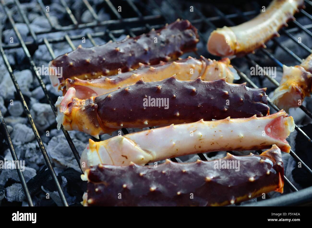 king crab legs on barbecue in summer Stock Photo Alamy