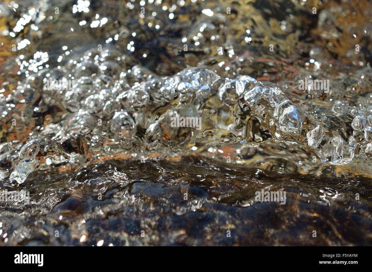 bubbly fresh river water flow macro photo background Stock Photo Alamy