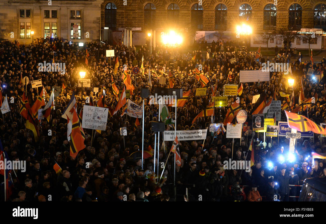 Dresden, Germany. 9th Nov, 2015. Supporters of Pegida, an anti-immigrant group whose name roughly translates to Patriotic Europeans Against the Islamization of Europe, demonstrate in Dresden, Germany, 9 November 2015. Photo: Arno Burgi/dpa/Alamy Live News Stock Photo