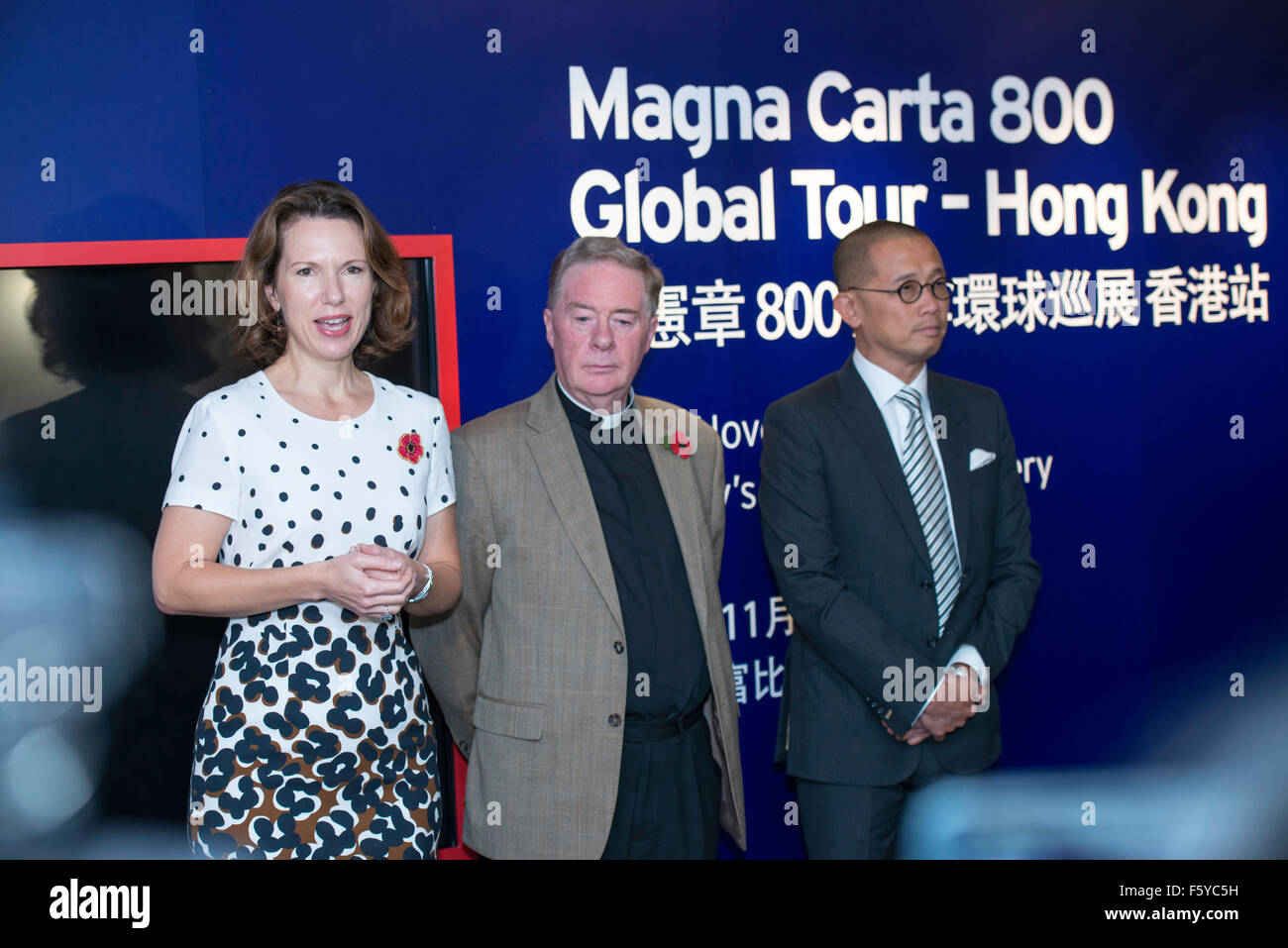 Hong Kong, China. 10th Nov, 2015. Sotheby's Asia CEO Kevin Ching (R)welcomes media to the opening event along with British Consul-General Caroline Wilson (L)and Chancellor Canon Chris Pullin (R). Magna Carta 800 Global tour comes to Hong Kong. Hereford Cathedral are exhibiting this 1217AD copy of the Magna Carta on a tour that takes in 9 countries including Hong Kong Credit:  Jayne Russell/Alamy Live News Stock Photo