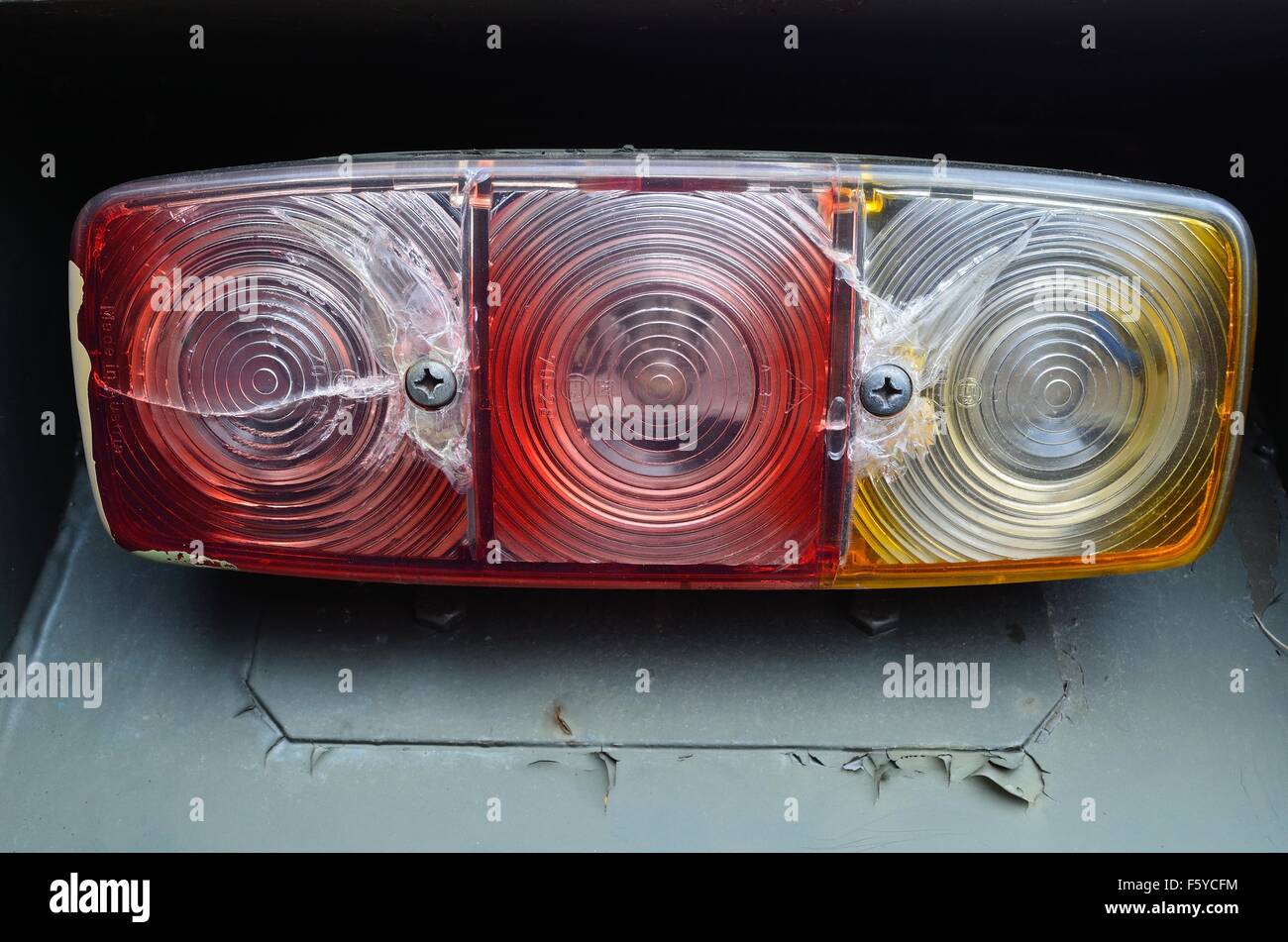 broken and cracked tractor tail lights Stock Photo Alamy
