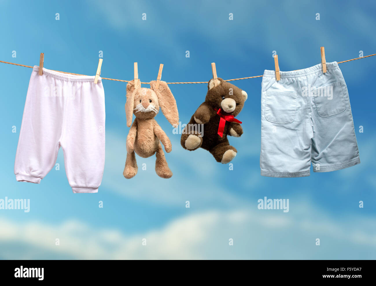 Boy or girl? on the outdoor clothesline Stock Photo