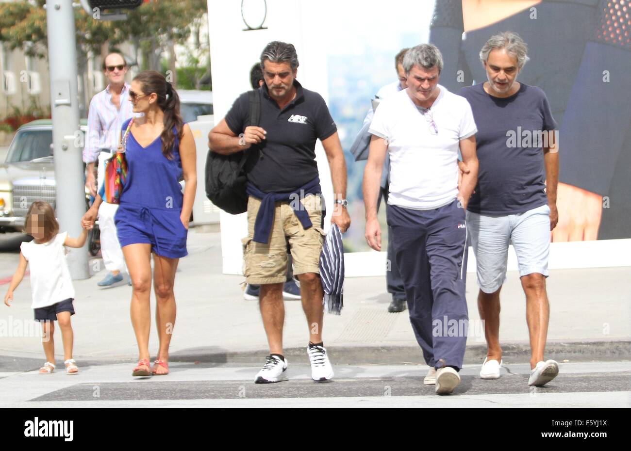 Andrea Bocelli receives a gift while eating lunch in Beverly Hills 
