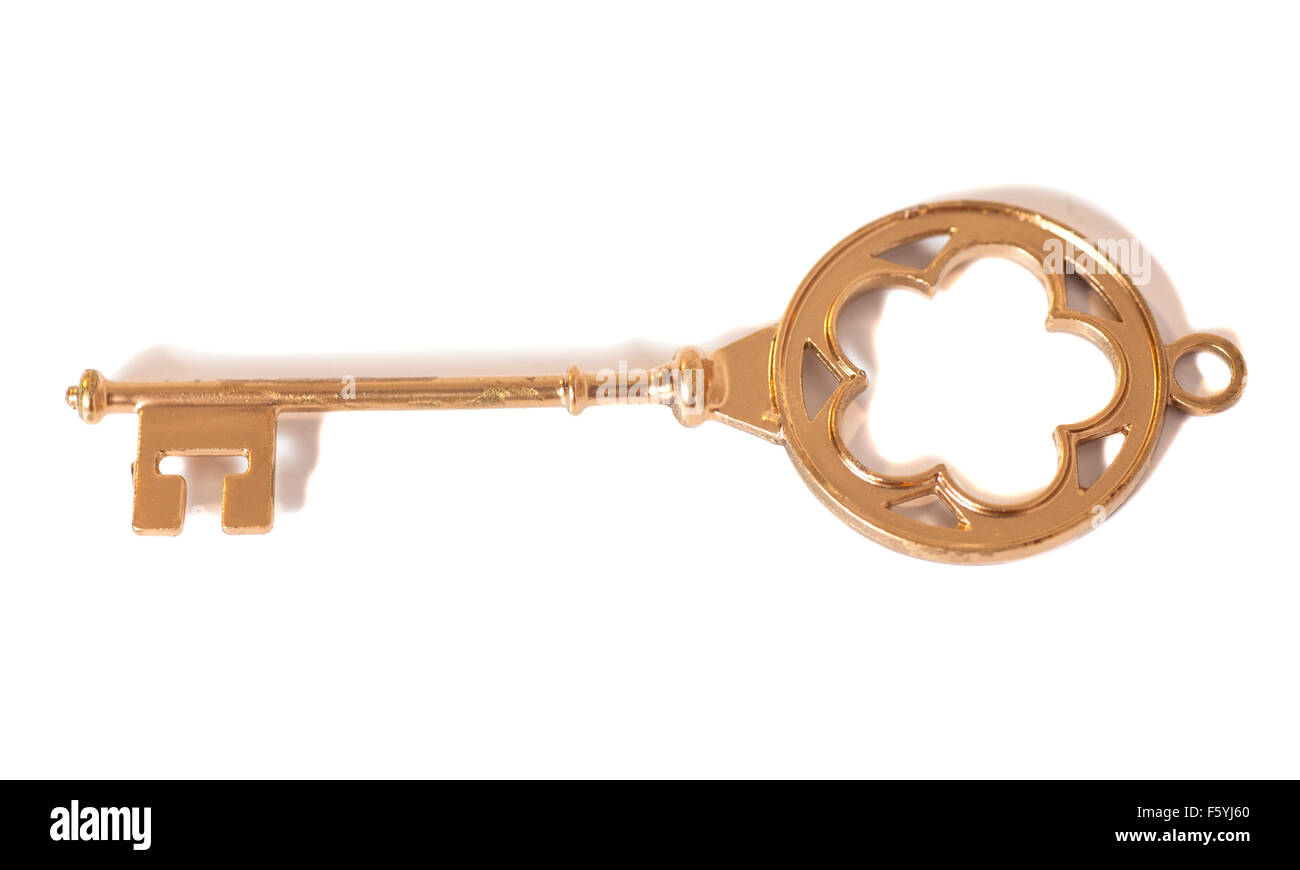 Golden Key isolated on white background Stock Photo - Alamy