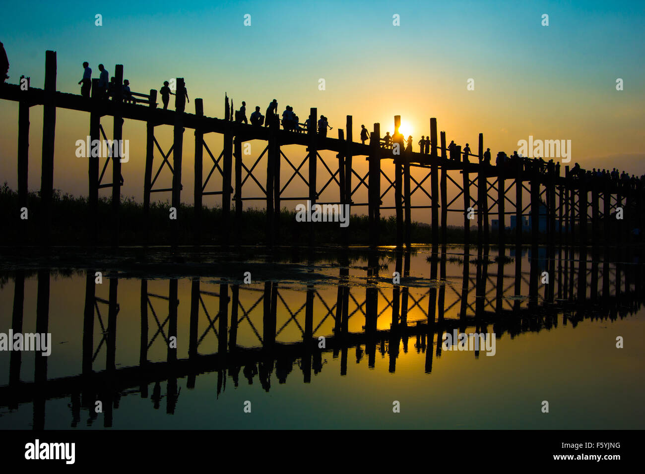 Silhouette during sunset at U Bein Bridge, Mandalay, Myanmar Stock Photo