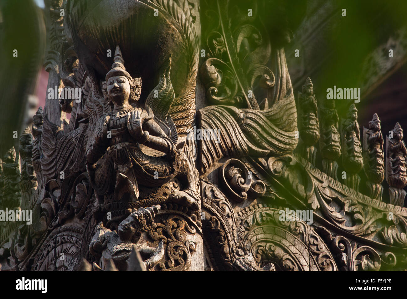 Carvings on top of Shwenandaw Kyaung Temple or Golden Palace Monastery in Mandalay, Myanmar Stock Photo