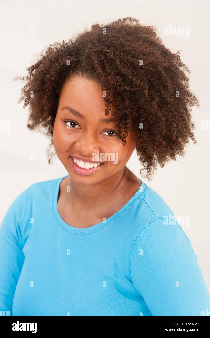 Beautiful young woman smiling for the camera Stock Photo - Alamy