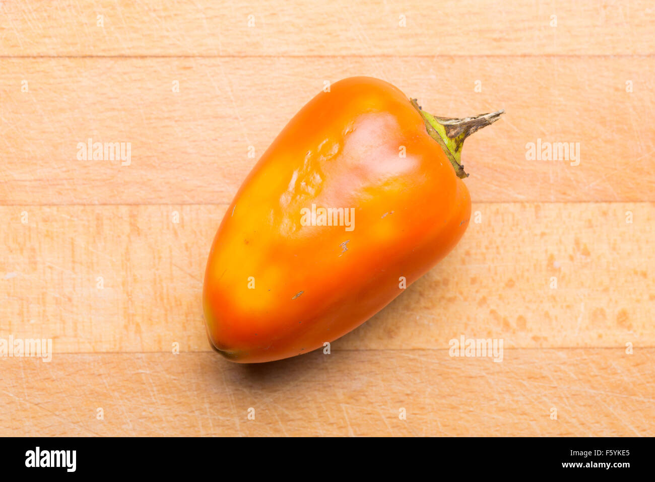 Natural yellow and orange bell pepper from the garden Stock Photo