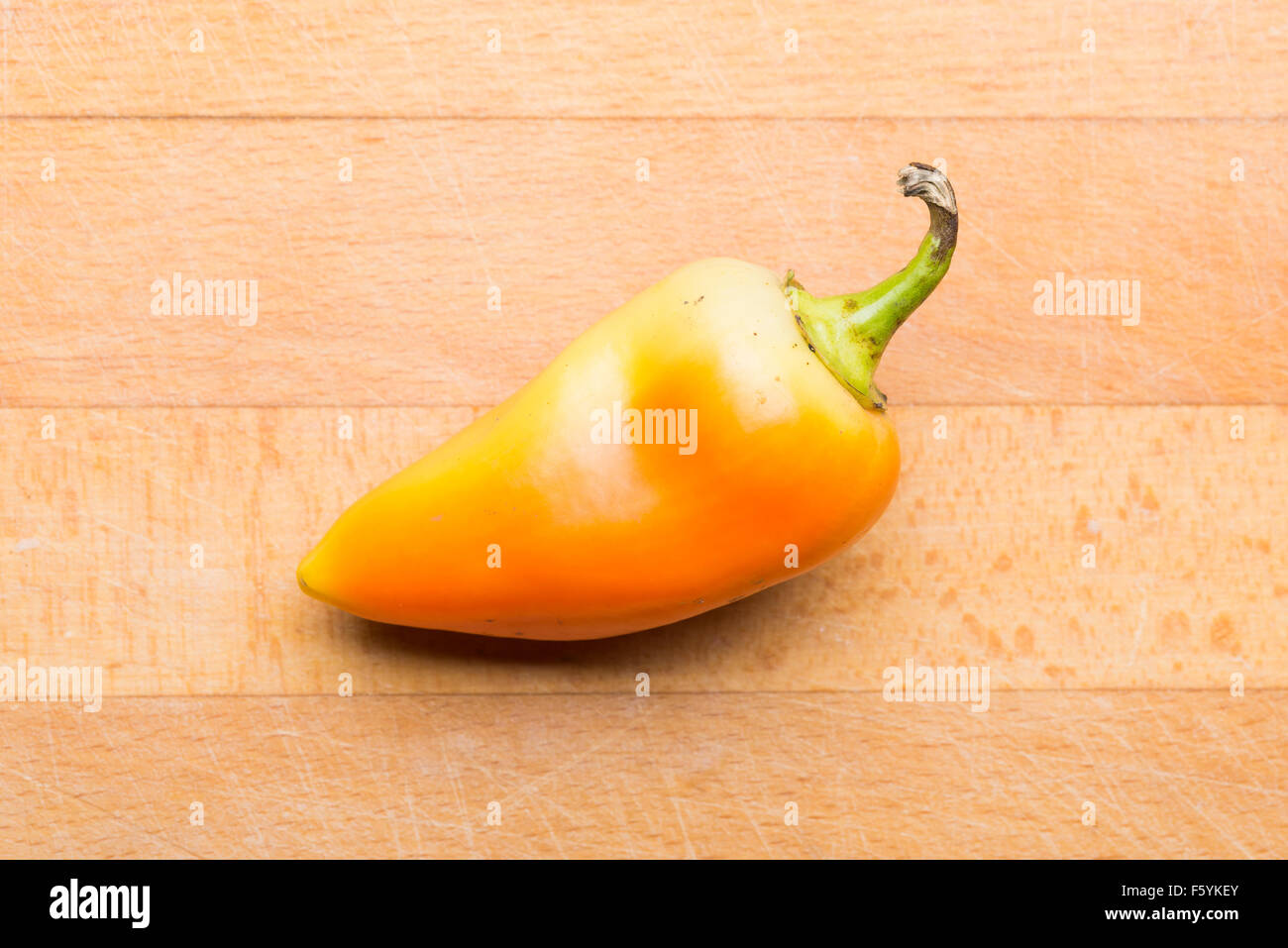 Natural yellow and orange bell pepper from the garden Stock Photo