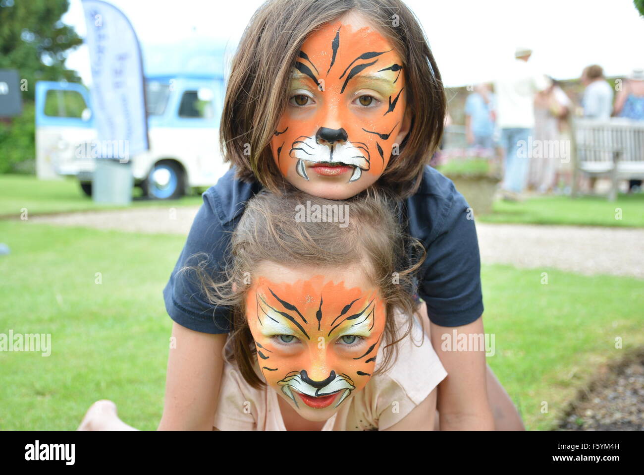 Playgrounds,kids, face painting, estates, day's out, play, kids care, schools, kids environments, children, community, parks Stock Photo