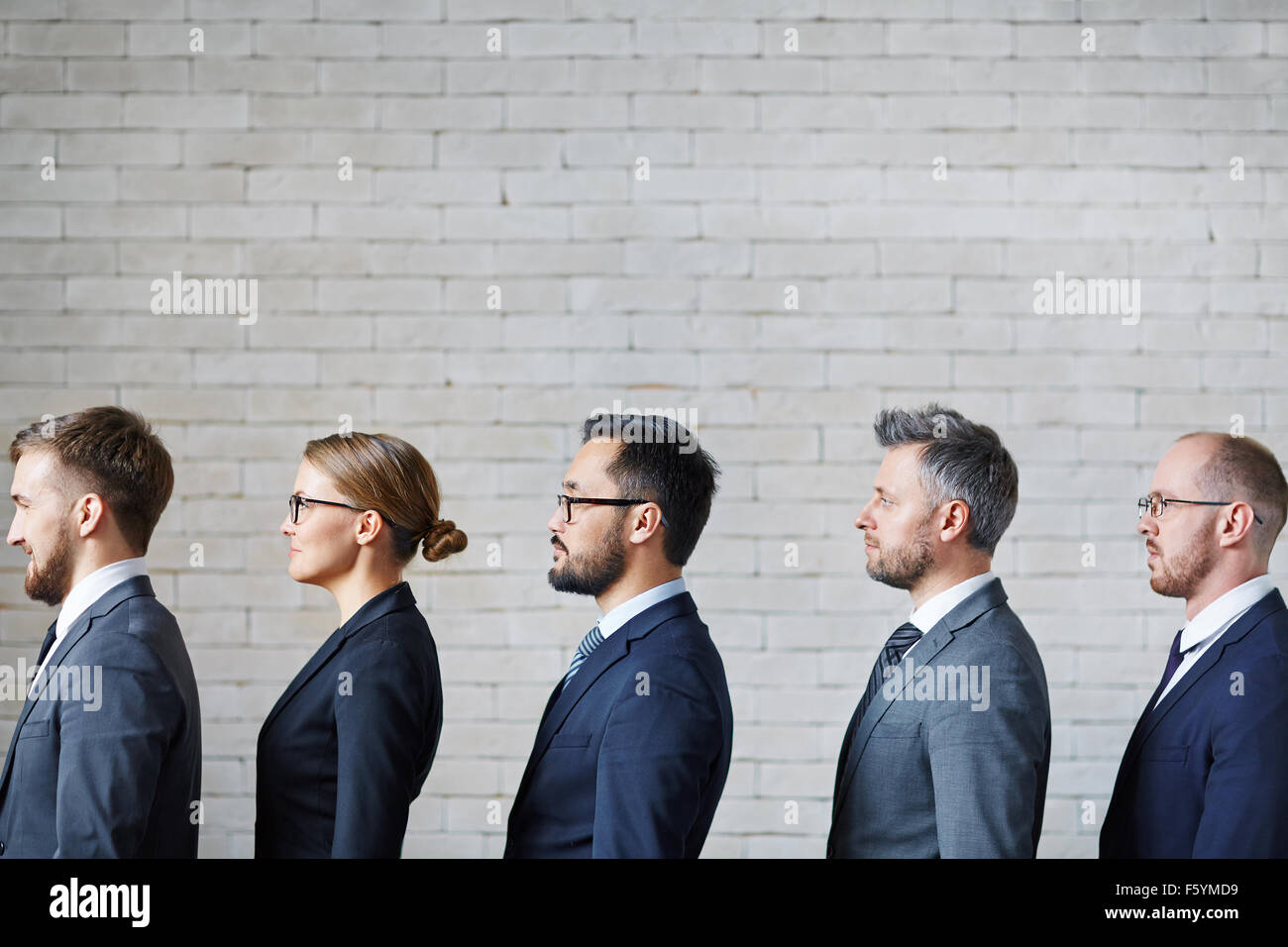 Row standing people hi-res stock photography and images - Alamy