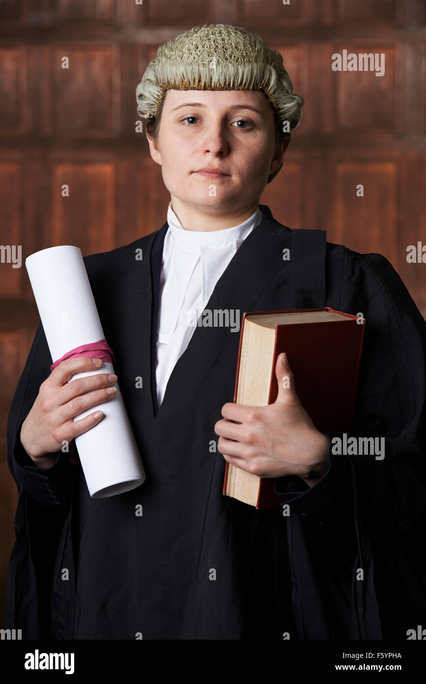 Portrait Of Lawyer In Court Holding Brief And Book Stock Photo