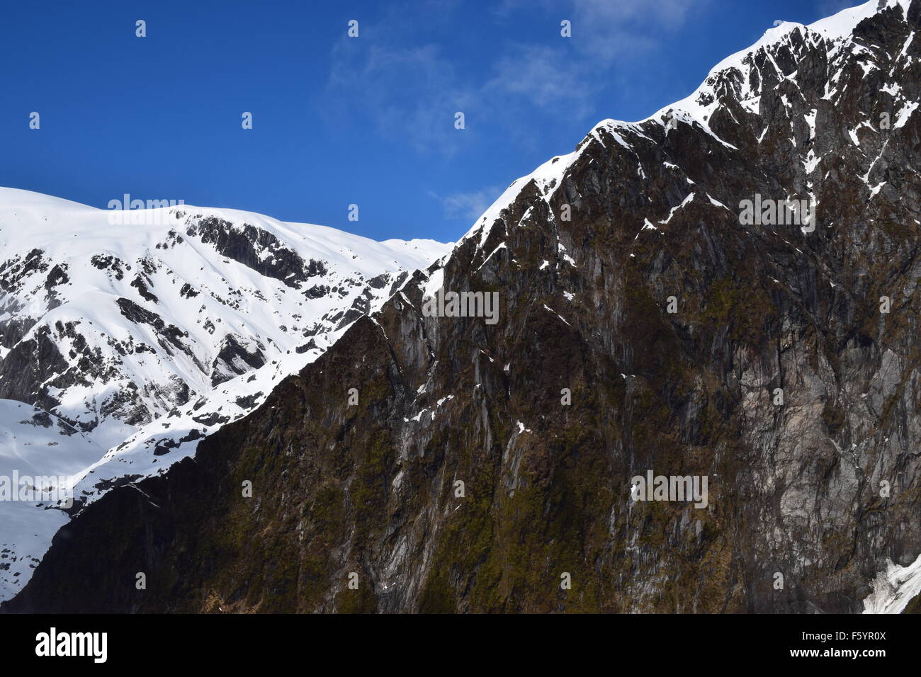 Snow capped Remarkables mountain range near Queenstown in the beautiful South Island of New Zealand. Stock Photo