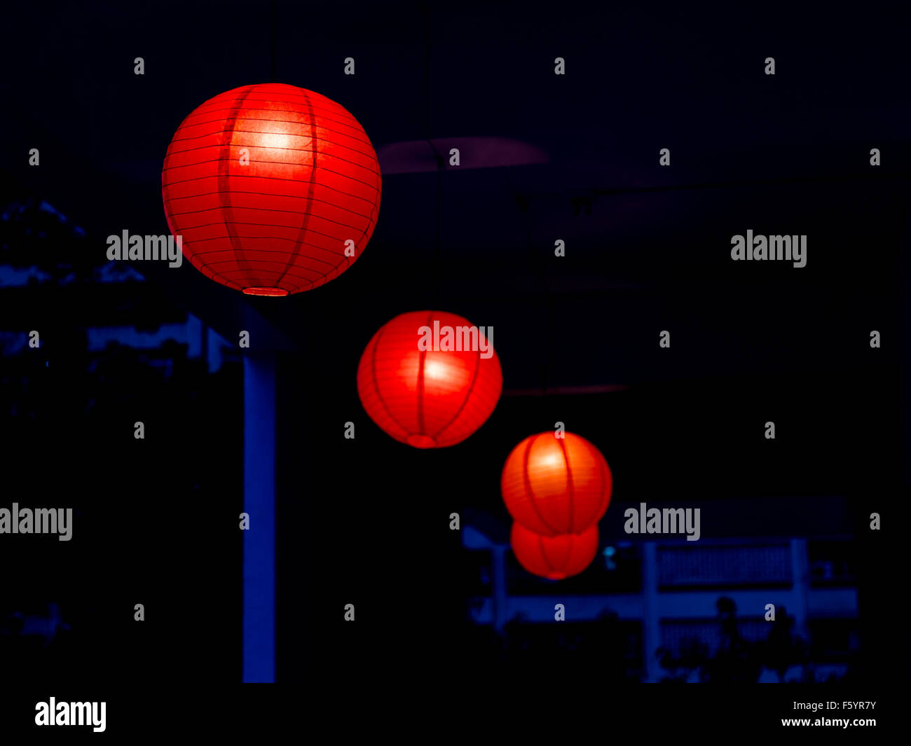 Row of red Chinese lanterns hanging Stock Photo - Alamy