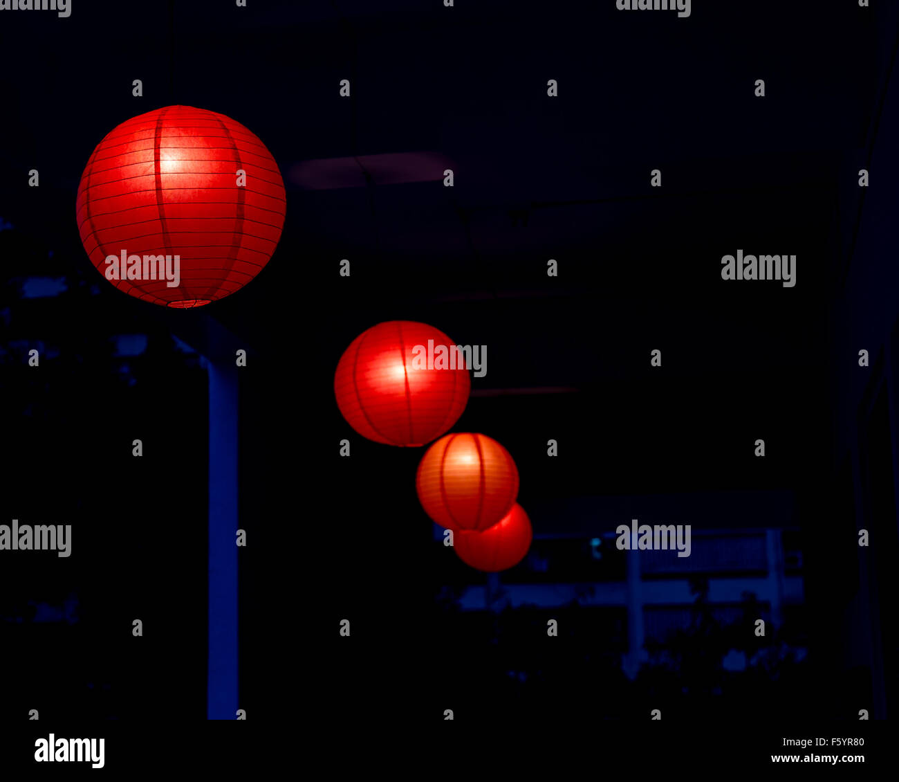 Row of red Chinese lanterns hanging Stock Photo - Alamy