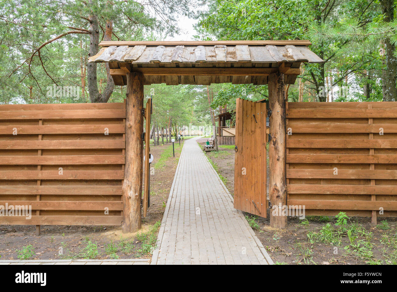 Wooden gate and fence at the entrance to the park Stock Photo - Alamy