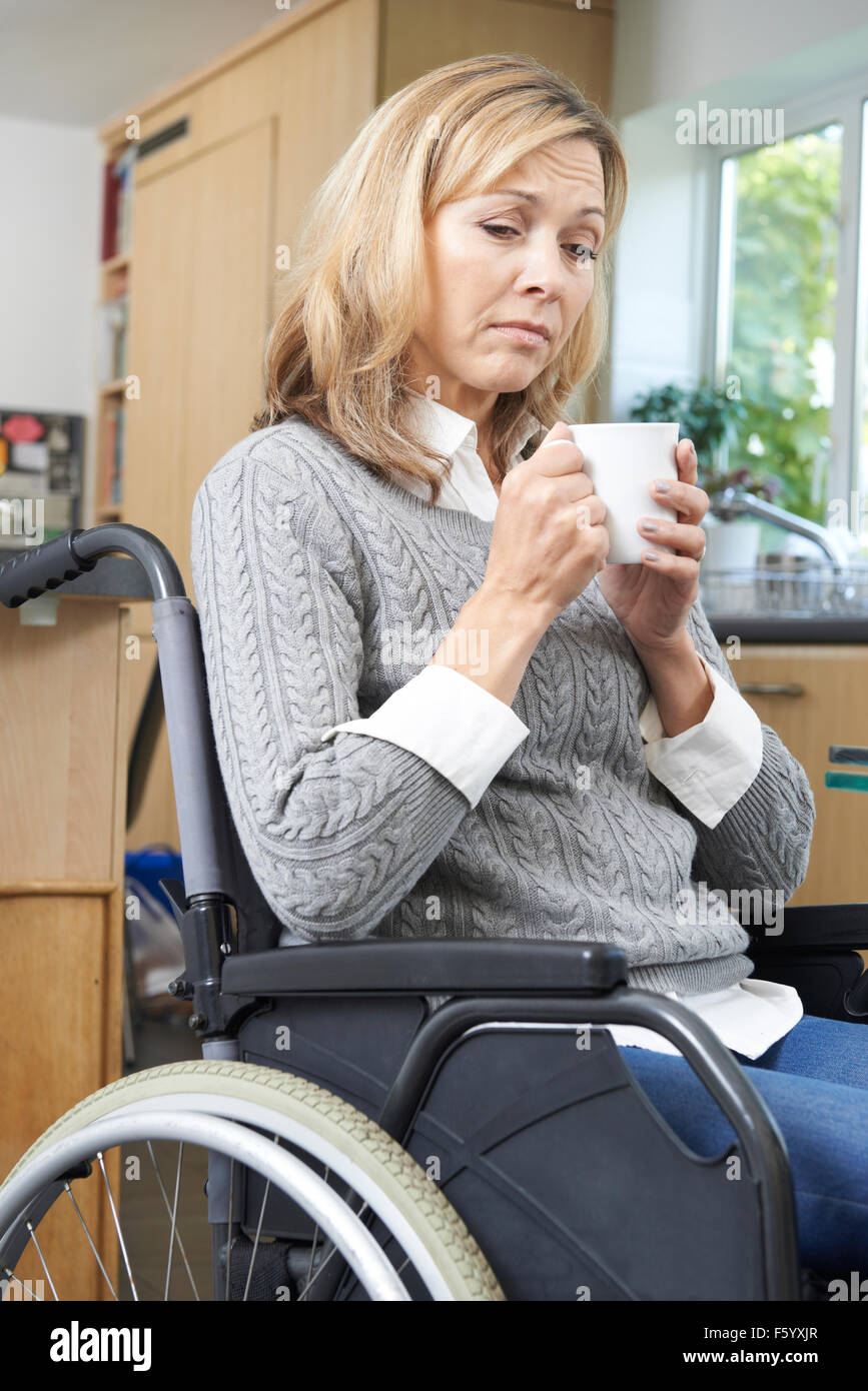 Mature woman in wheelchair in hi-res stock photography and images - Alamy
