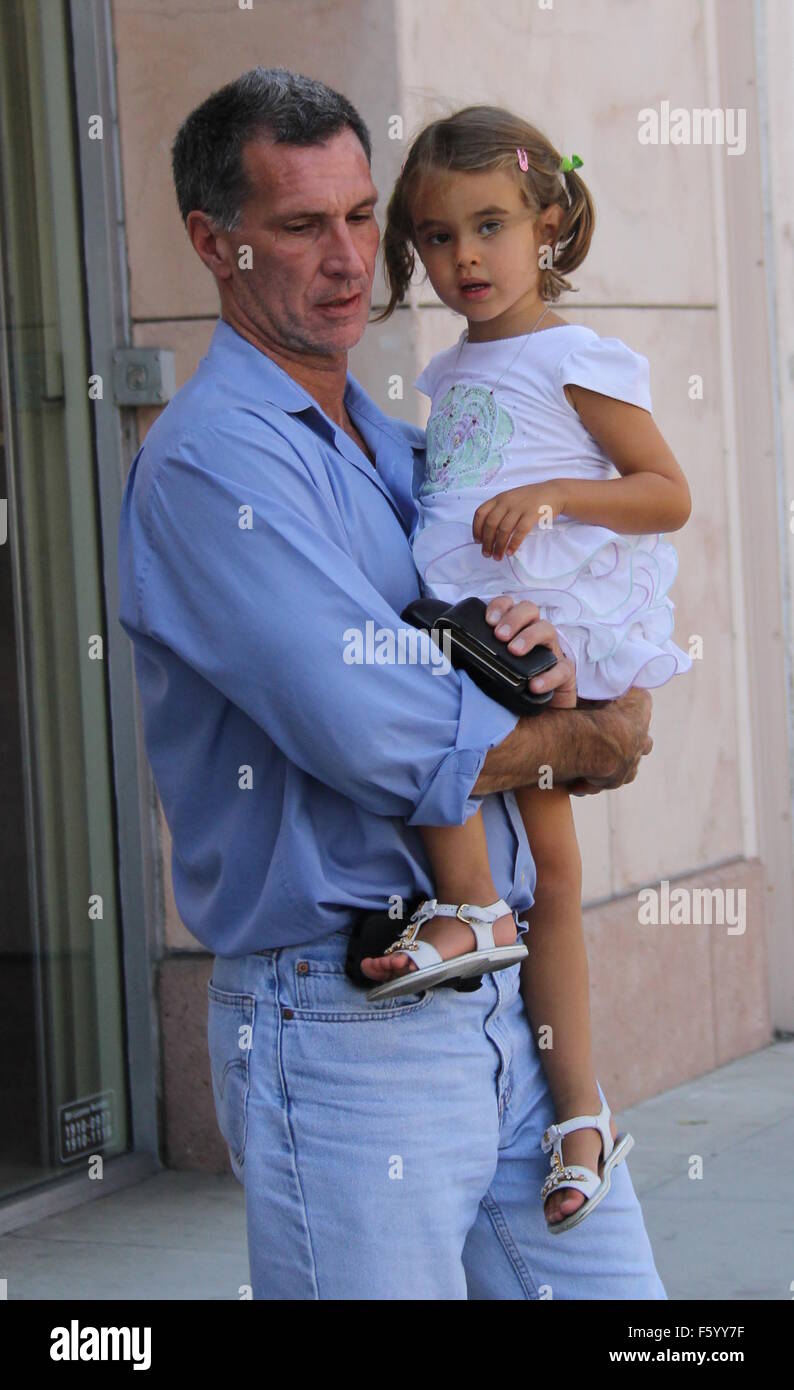 Andrea Bocelli picks up his 57th birthday cake at Il Pastaio with his wife Veronica Berti and their daughter Virginia  Featuring: Virginia Bocelli Where: Beverly Hills, California, United States When: 22 Sep 2015 Stock Photo