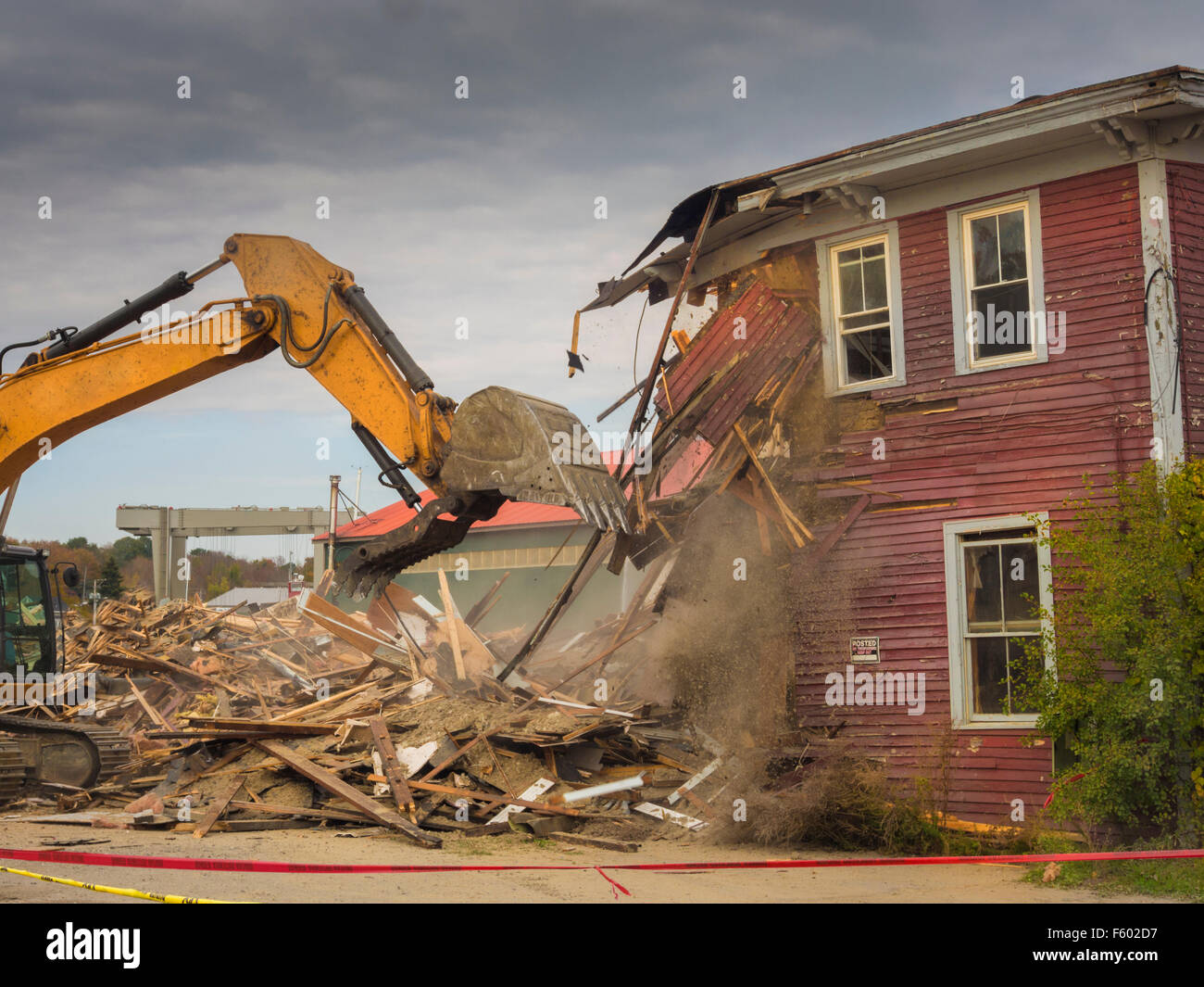 A digger demolishing a house for reconstruction Stock Photo Alamy