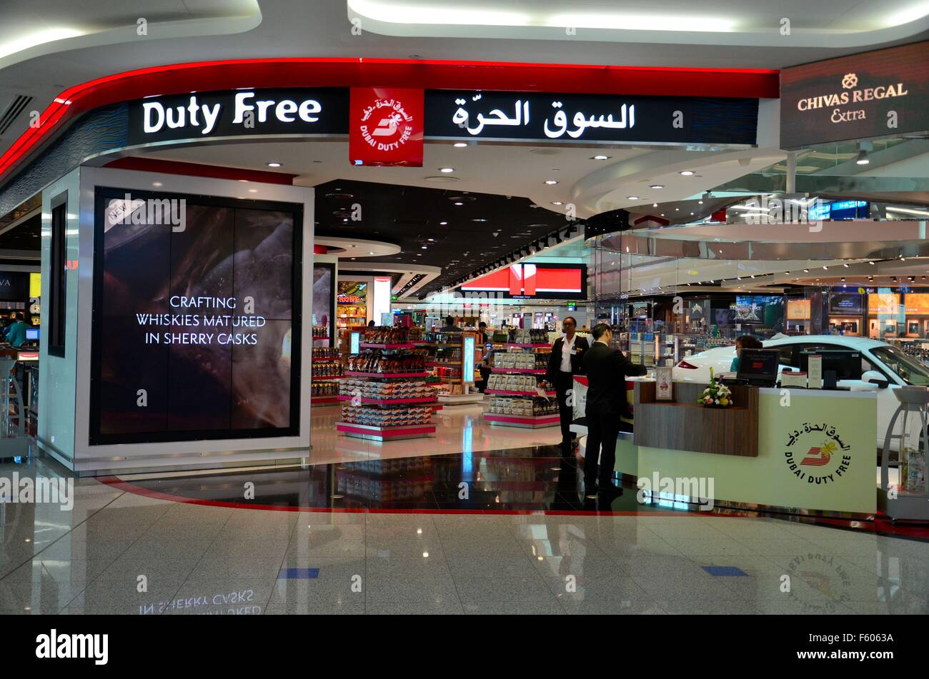 Duty free counter and shop at Dubai international airport United Arab Emirates UAE Stock Photo