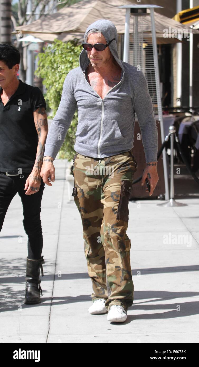 Mickey Rourke wearing a grey hoodie has lunch at Cafe Roma in Beverly ...