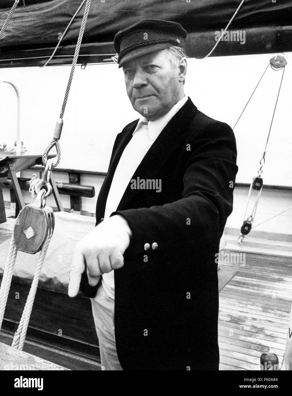 Helmut Schmidt is standing on board of his sail ship 