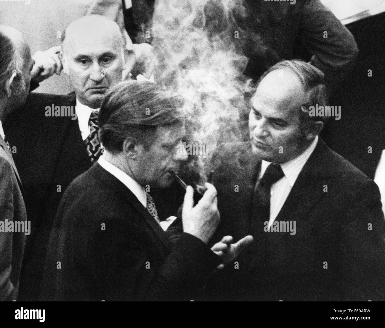 Defense Minister Helmut Schmidt (L) in a conversation with opposition leader Rainer Barzel (R) in the plenum of the German Bundestag in Bonn. The planned debate on the 'Ostverträge' was adjourned on 10 May 1972 for one week due to interfractional agreements. Stock Photo