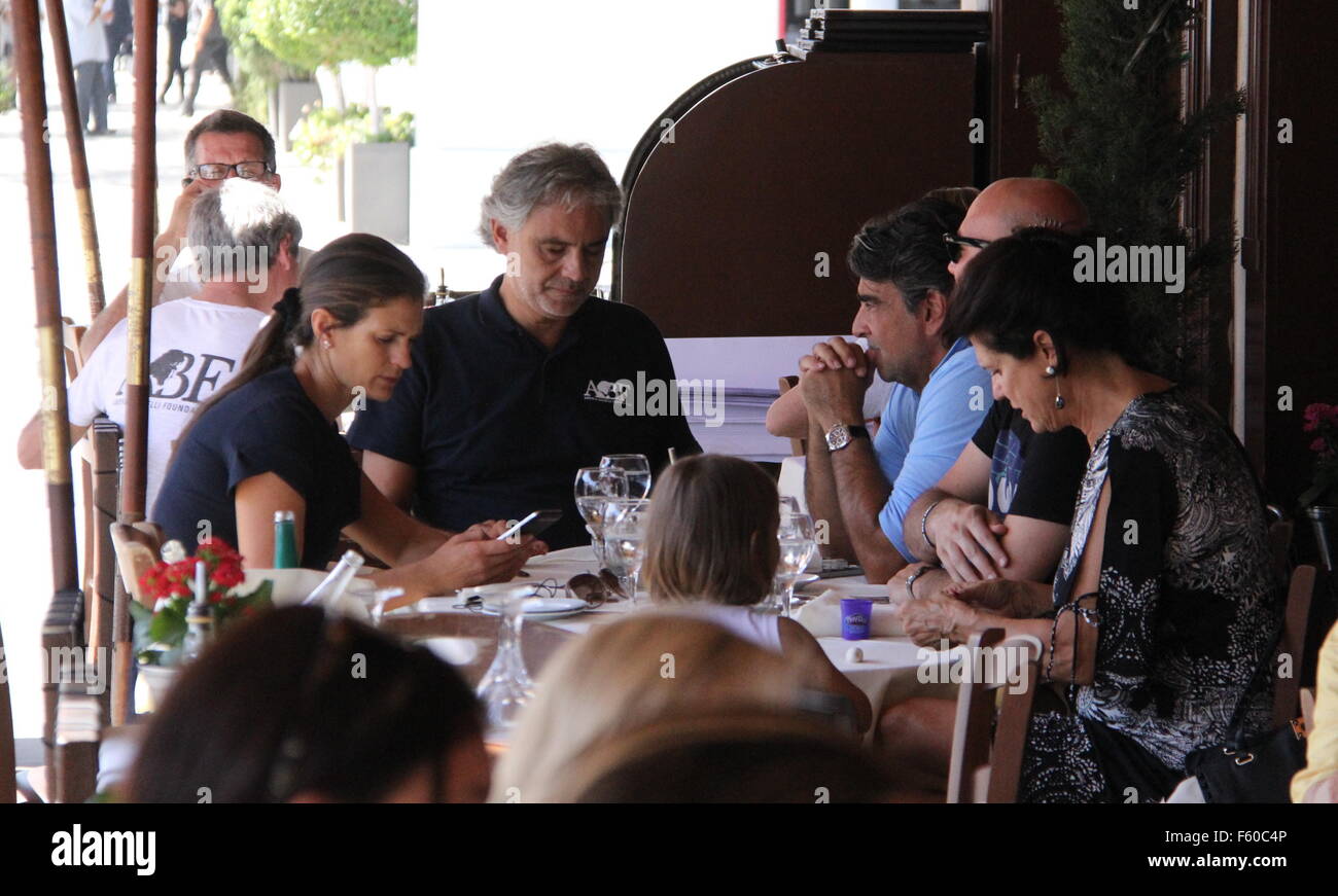 Andrea Bocelli receives a gift while eating lunch in Beverly Hills 