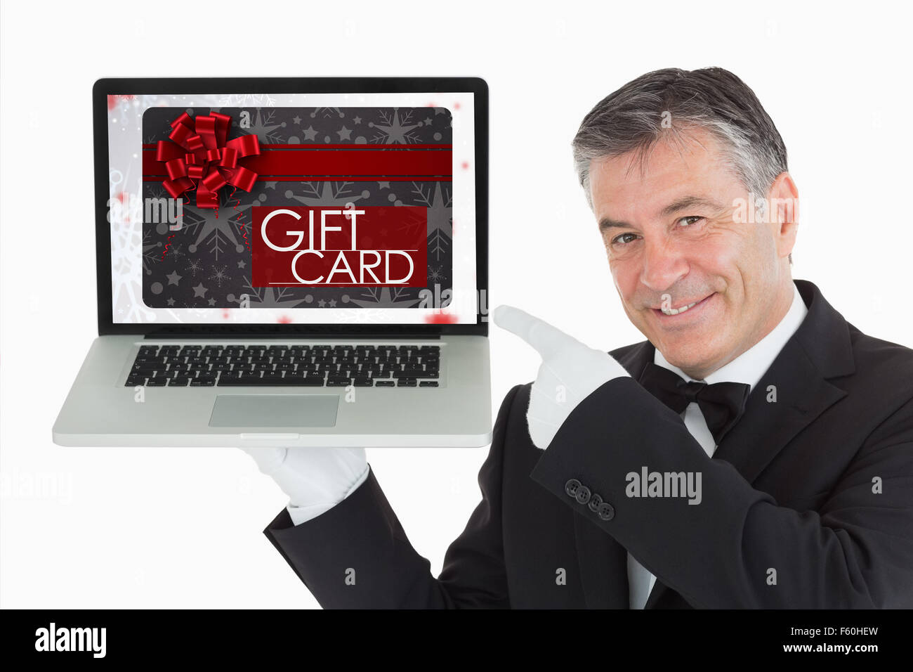 Composite image of gift card with festive bow Stock Photo