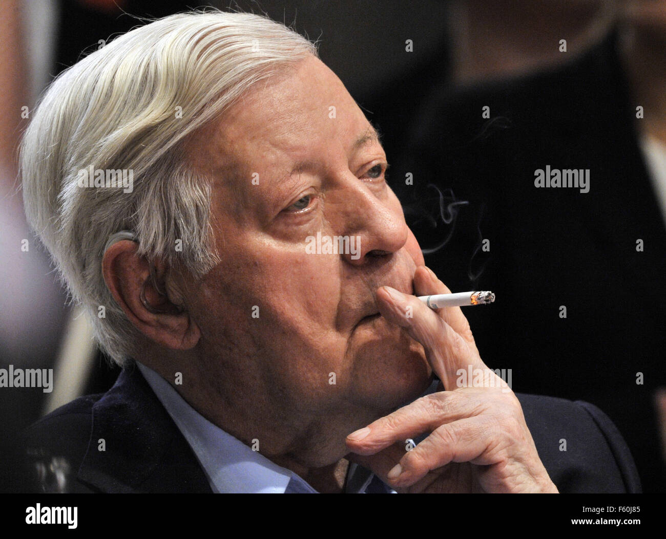 FILE - A file picture dated 18.10.2008 shows former German chancellor Helmut Schmidt smoking a cigarette during a SPD party meeting in Berlin, Germany. PHOTO: RAINER JENSEN DPA/LBN Stock Photo