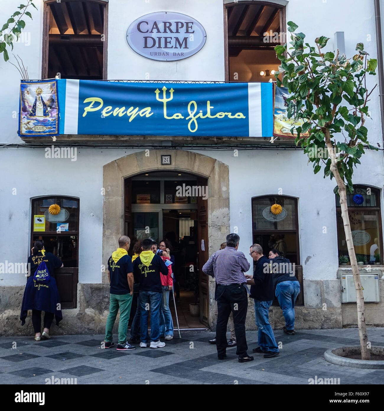 Benidorm, Spain. 10th November, 2015. A local restaurant has been taken over for a penya to use in the streets of the old town during the Spanish Fiesta which continues until Wednesday night. Credit:  Mick Flynn/Alamy Live News Stock Photo