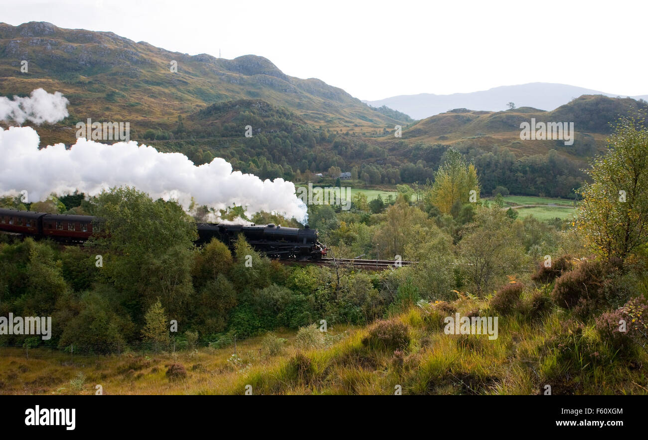 The Jacobite Steam Train passes over the Glenfinnan Viaduct. Stock Photo