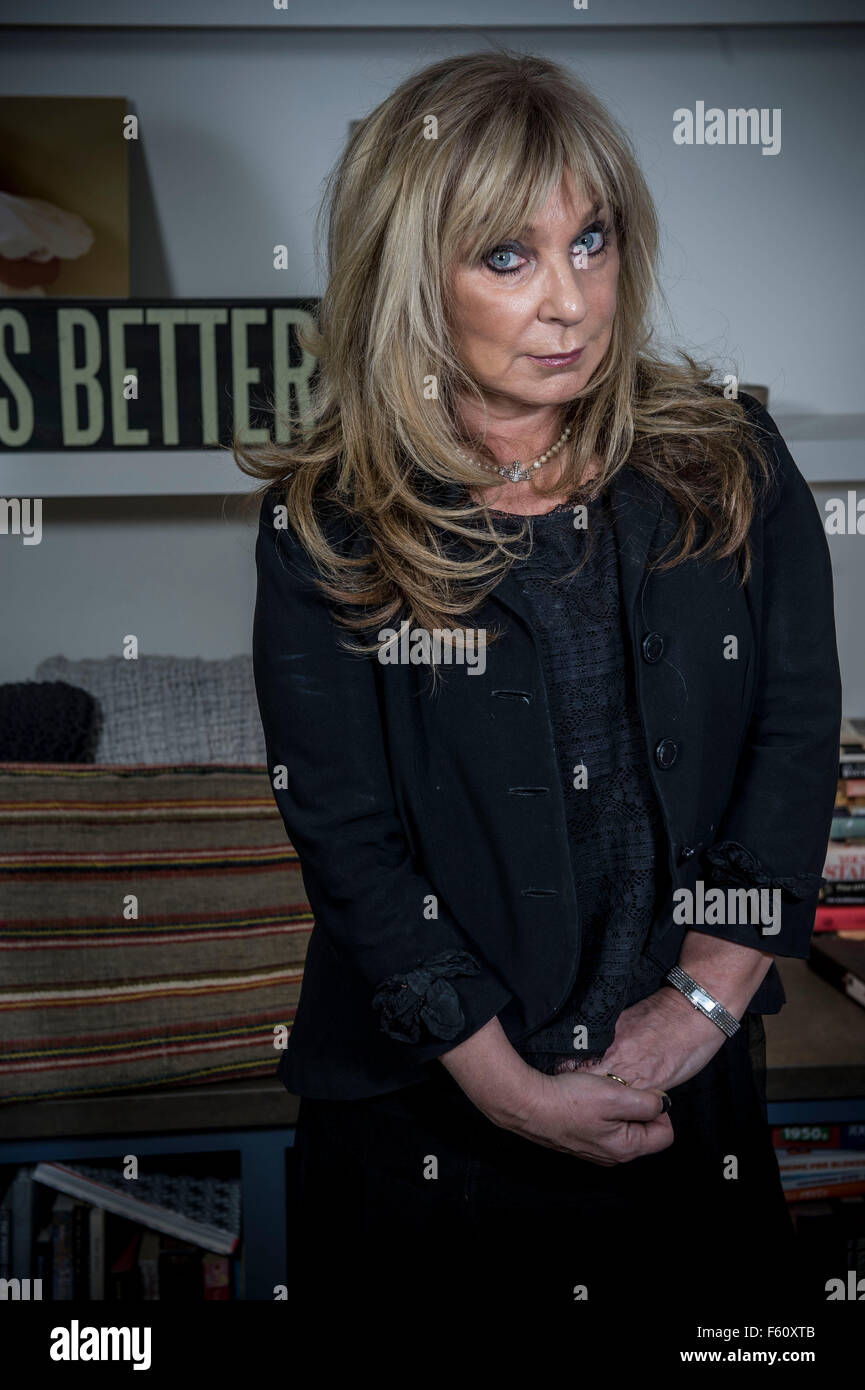Helen Lederer portraits UK comedy actor and writer showing off some of the home made cushions that she likes to throw together i Stock Photo