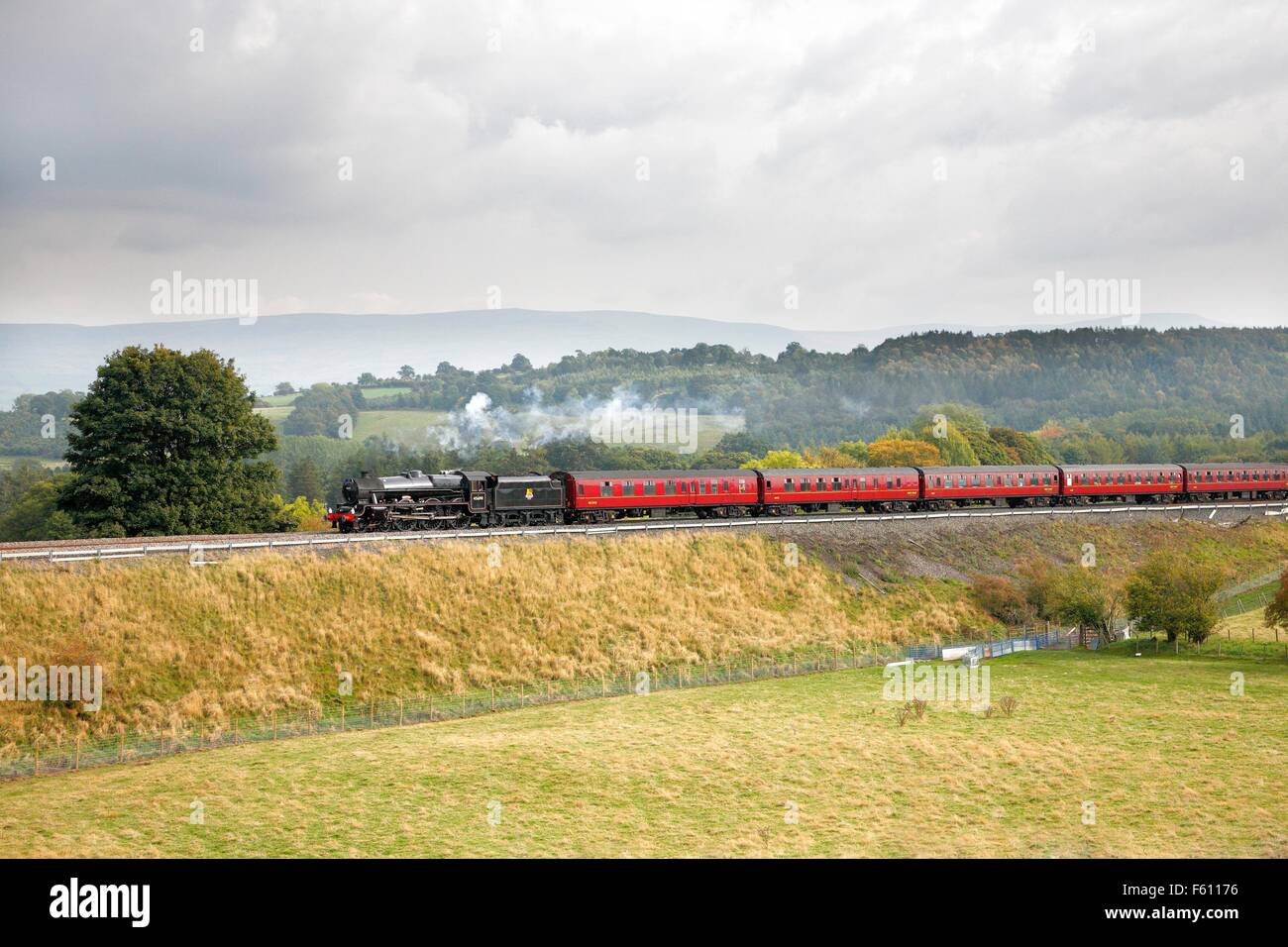 Steam locomotive LMS Jubilee Class Leander 45690 on the Settle to Carlisle Railway Line near Lazonby, Eden Valley, Cumbria, UK. Stock Photo