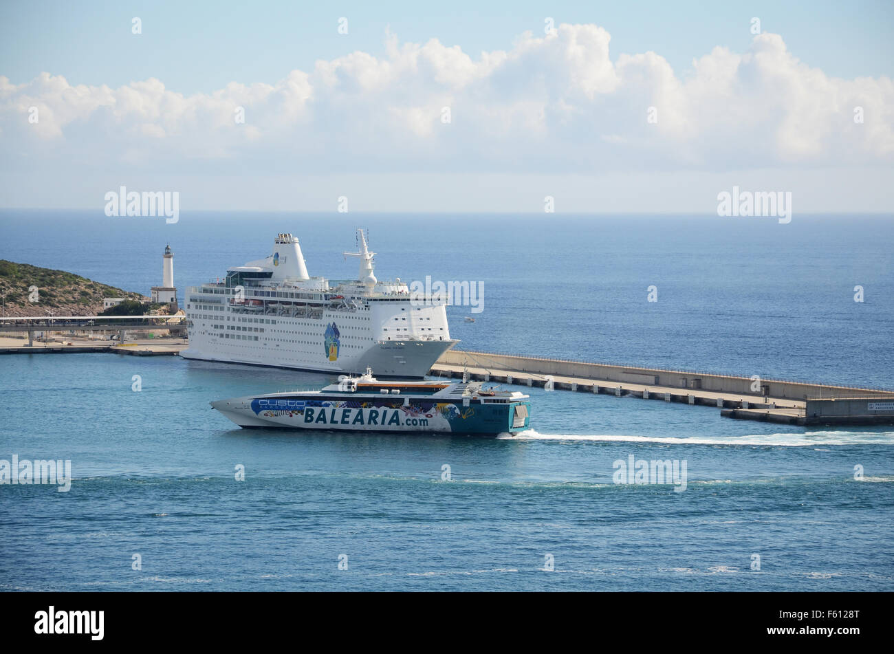Ramon Llull, Balearia fast ferry entering Eivissa harbor, Ibiza Spain Stock Photo