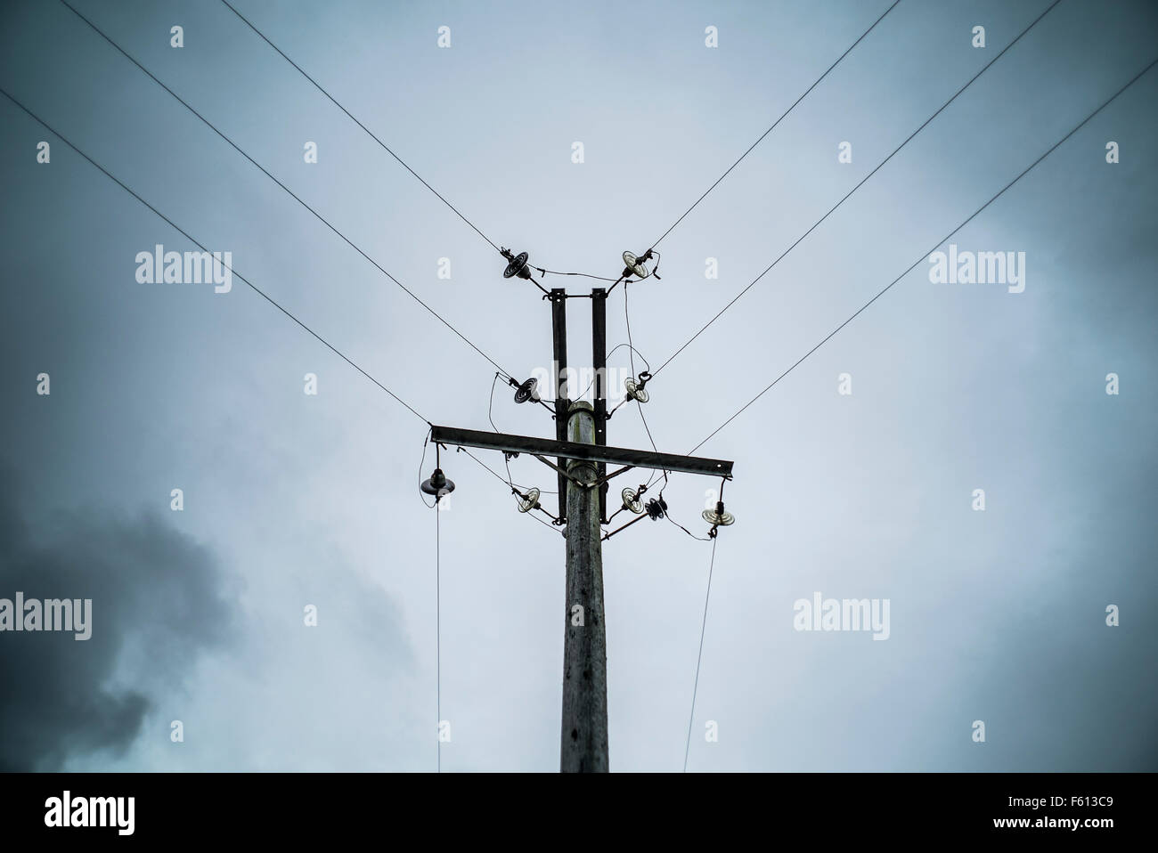 Overhead electricity power lines and pole Stock Photo Alamy