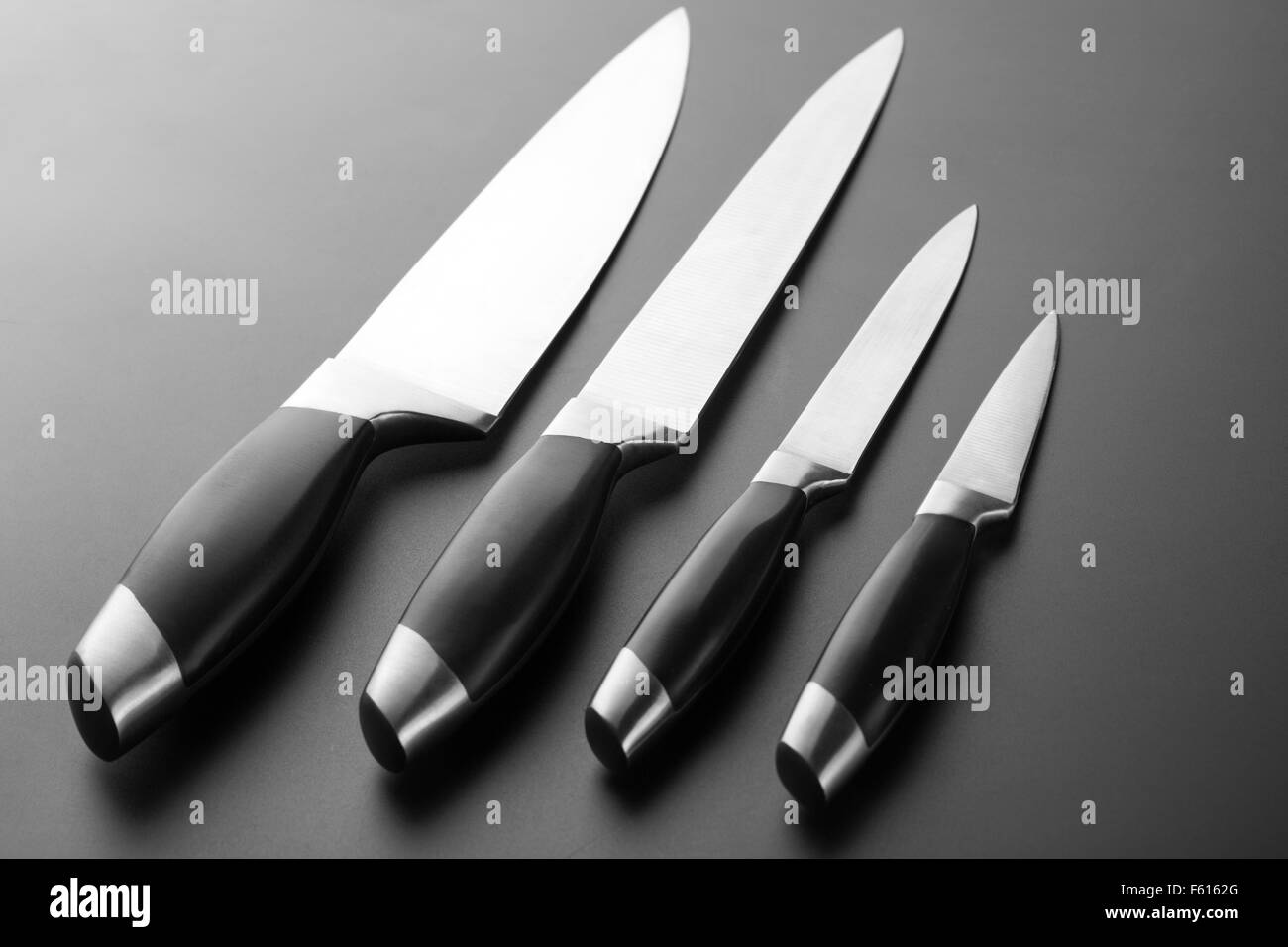 Set of professional kitchen knives Stock Photo Alamy